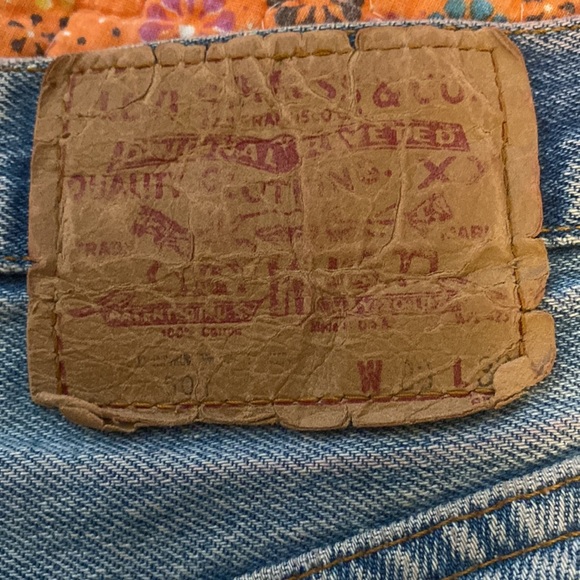 Vintage Levi's Blue Distressed Denim Shorts - Picture 9 of 16